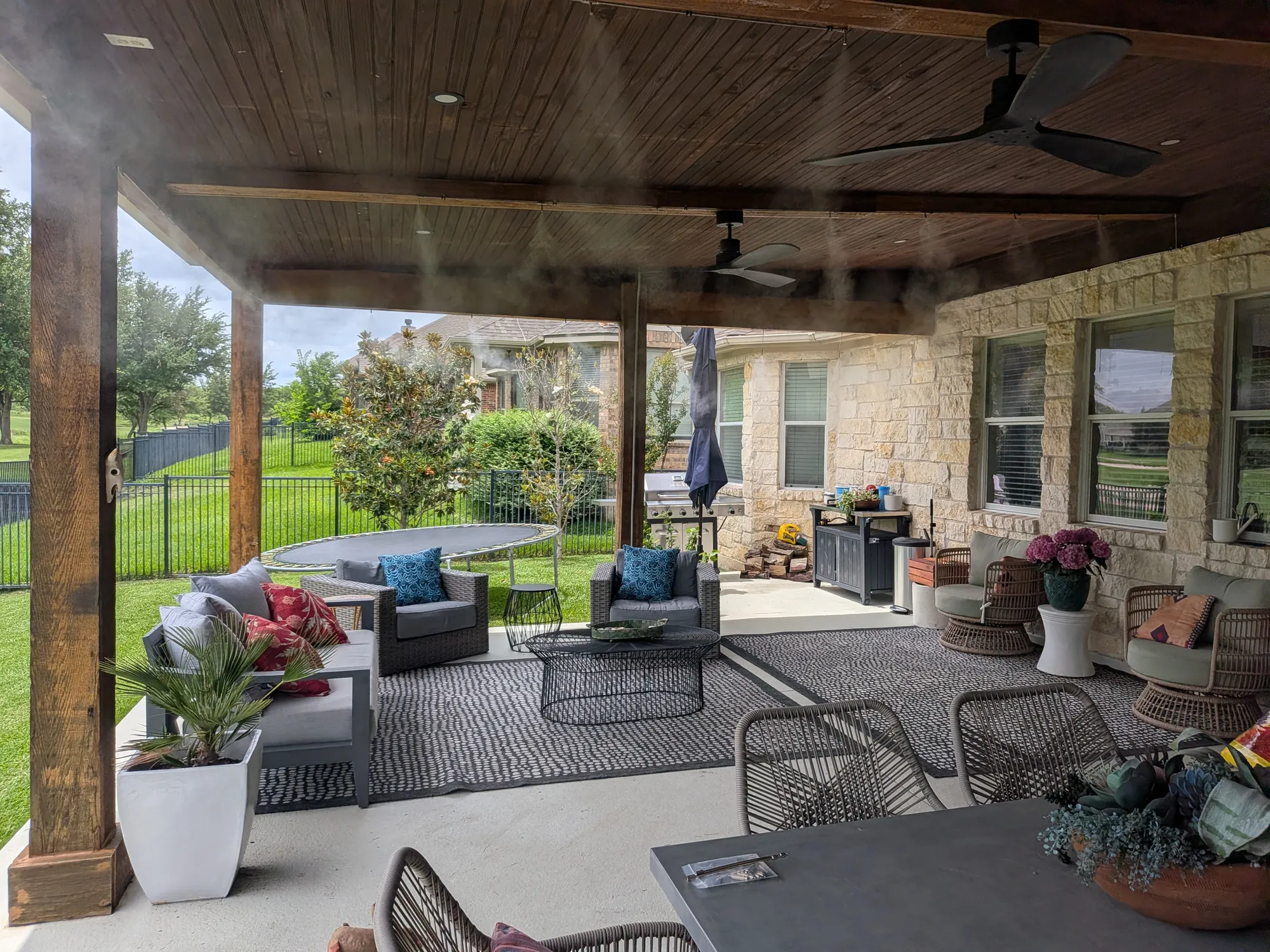 Covered patio misting system at an Austin home