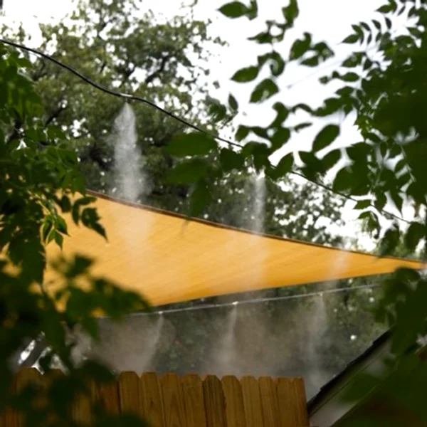 Sunshade with misting nozzles